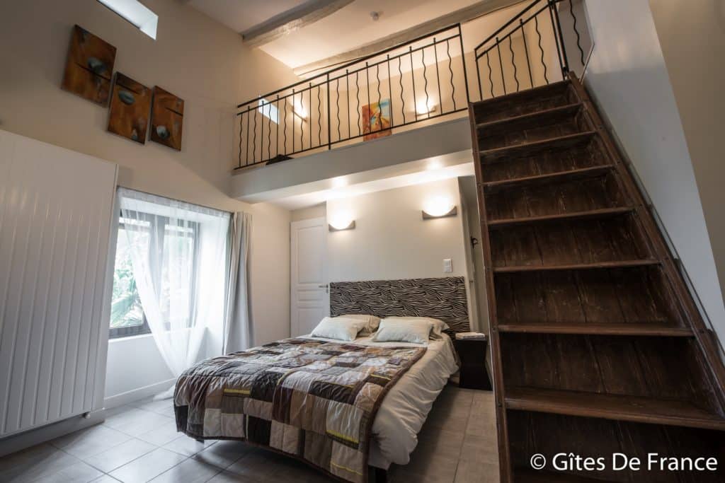 La chambre Icare de la Maison d'hôtes Altamica avec vue sur le palmier